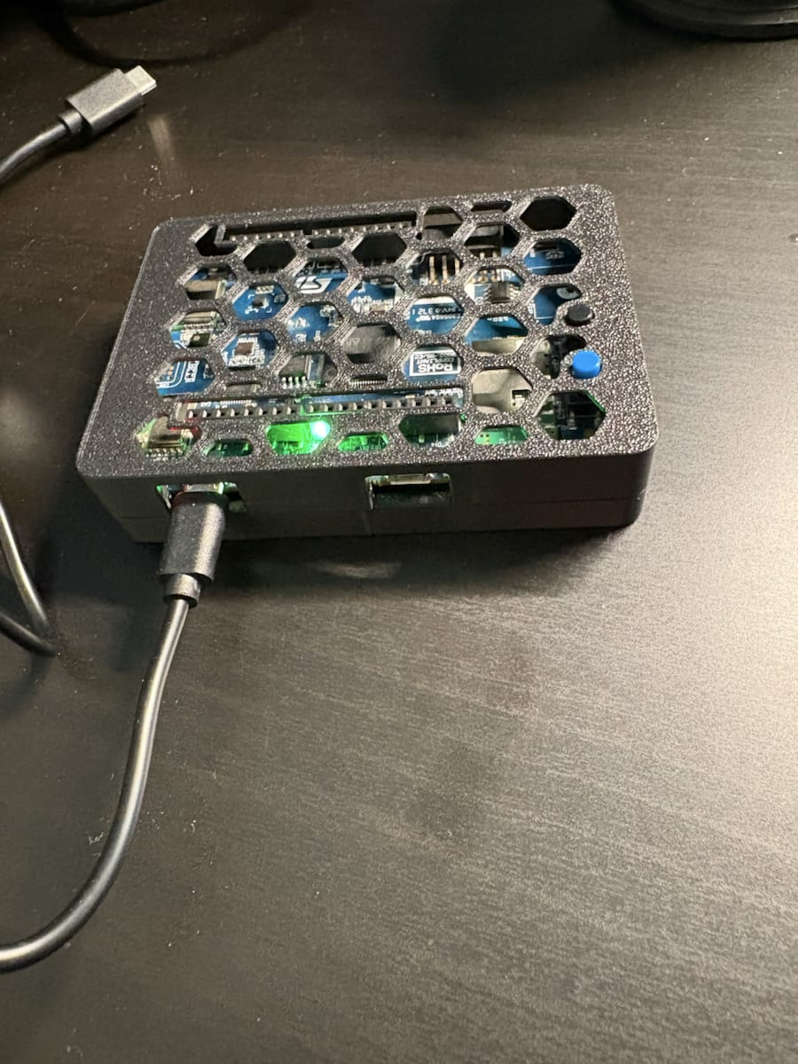 Notes from designing a functional prototype enclosure for the STM32 `B-L475E-IOT01A2` before field testing: which board details mattered, how documentation and real measurements shaped the print, and why service access, transport, and fast reprints mattered more than visual polish.